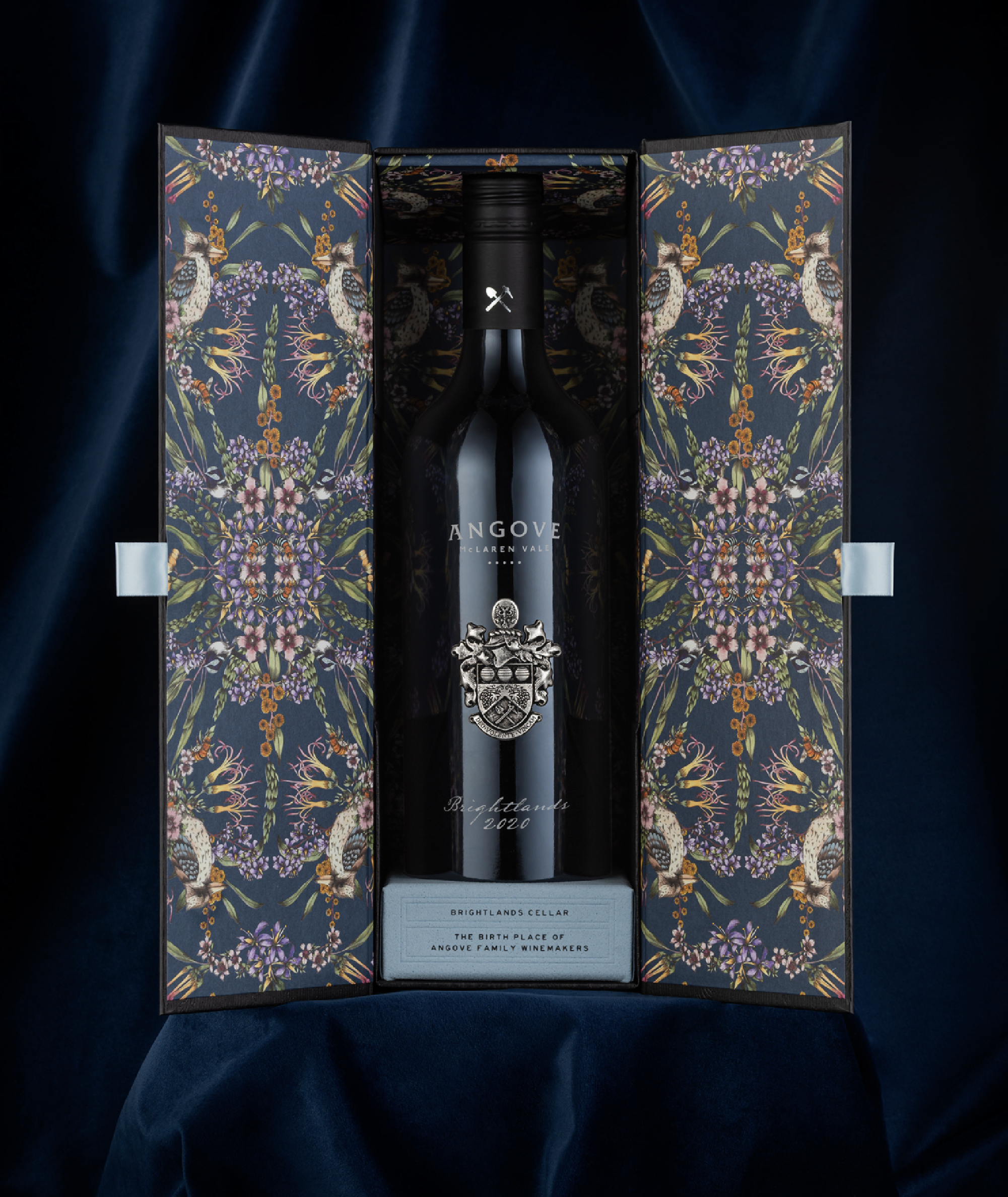 Open gift box of Angove Brightlands Shiraz featuring kaleidoscope illustration of Adelaide hills nature and birds