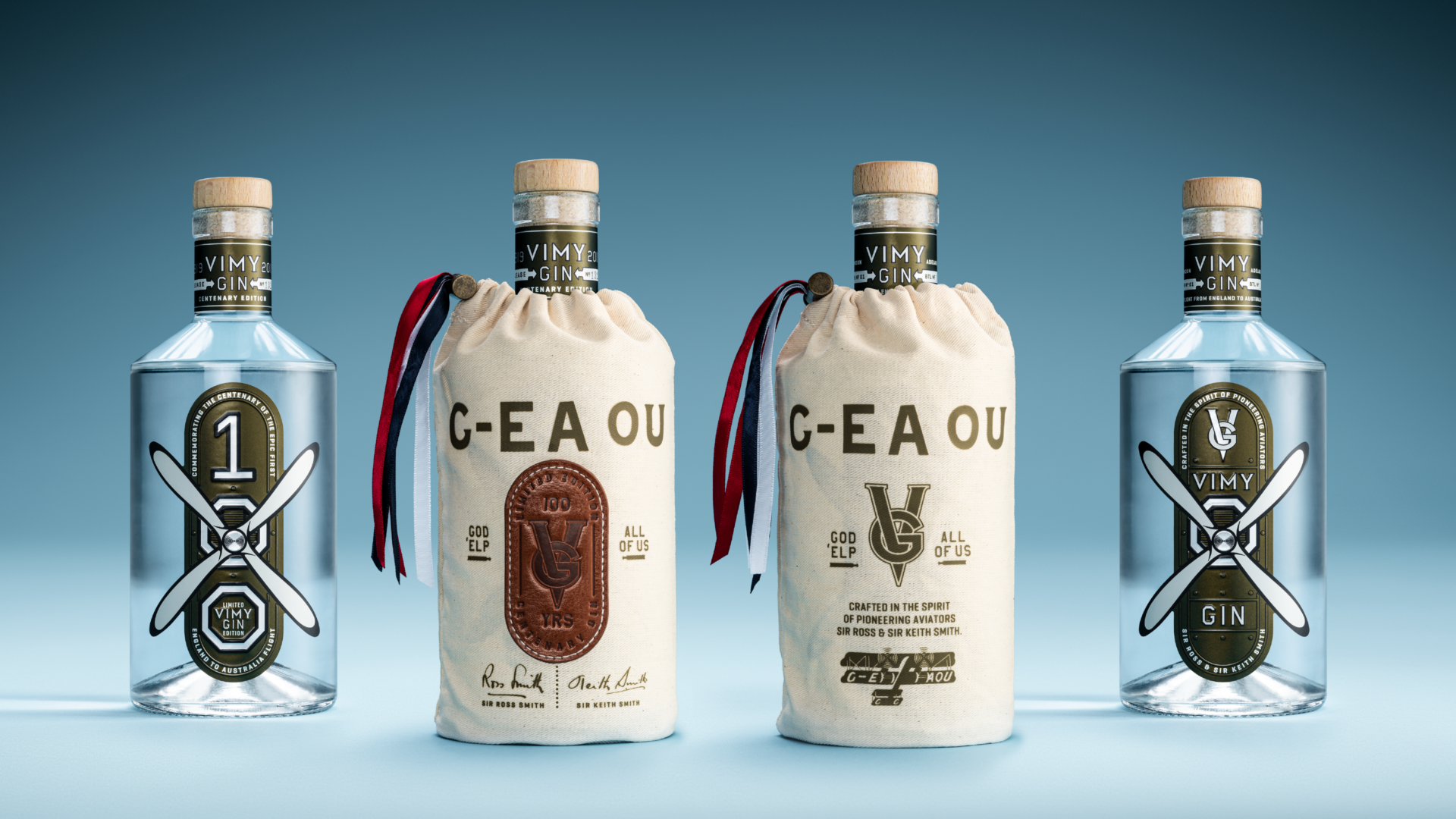 A photograph of 4 Vimy Gin bottles on a blue background featuring aviation themed labels and 2 with custom calico outer packaging.