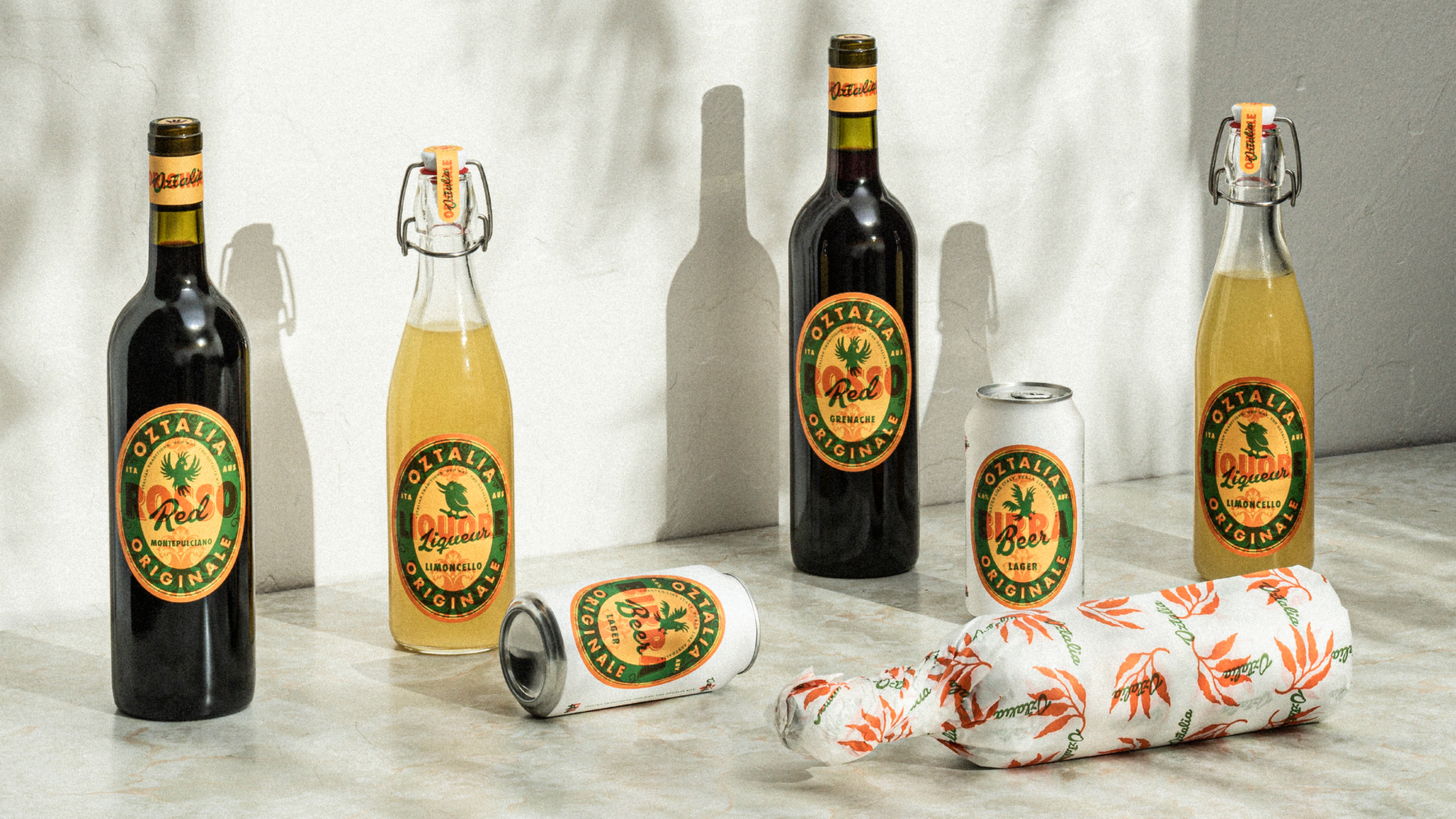 A photograph of the Oztalia alcohol range with a natural and rendered finish white background.