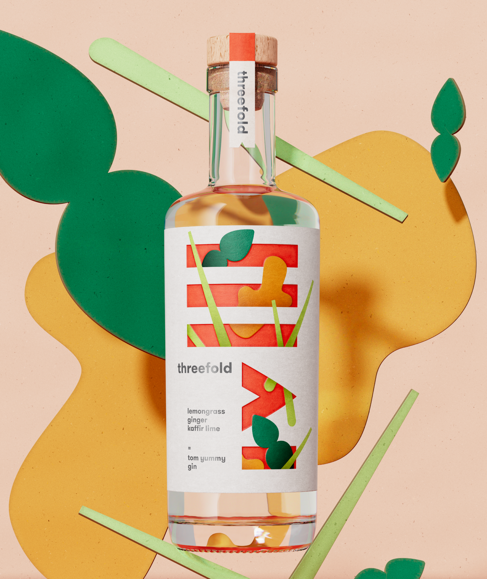 A photograph of a bottle of Threefold Tom Yummy gin with colourful packaging design perched on colourful, floating cutout shapes of botanicals featured in the gin. 
