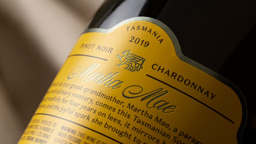 Yellow back label with deboss, foil embellishment for Corryton Burge