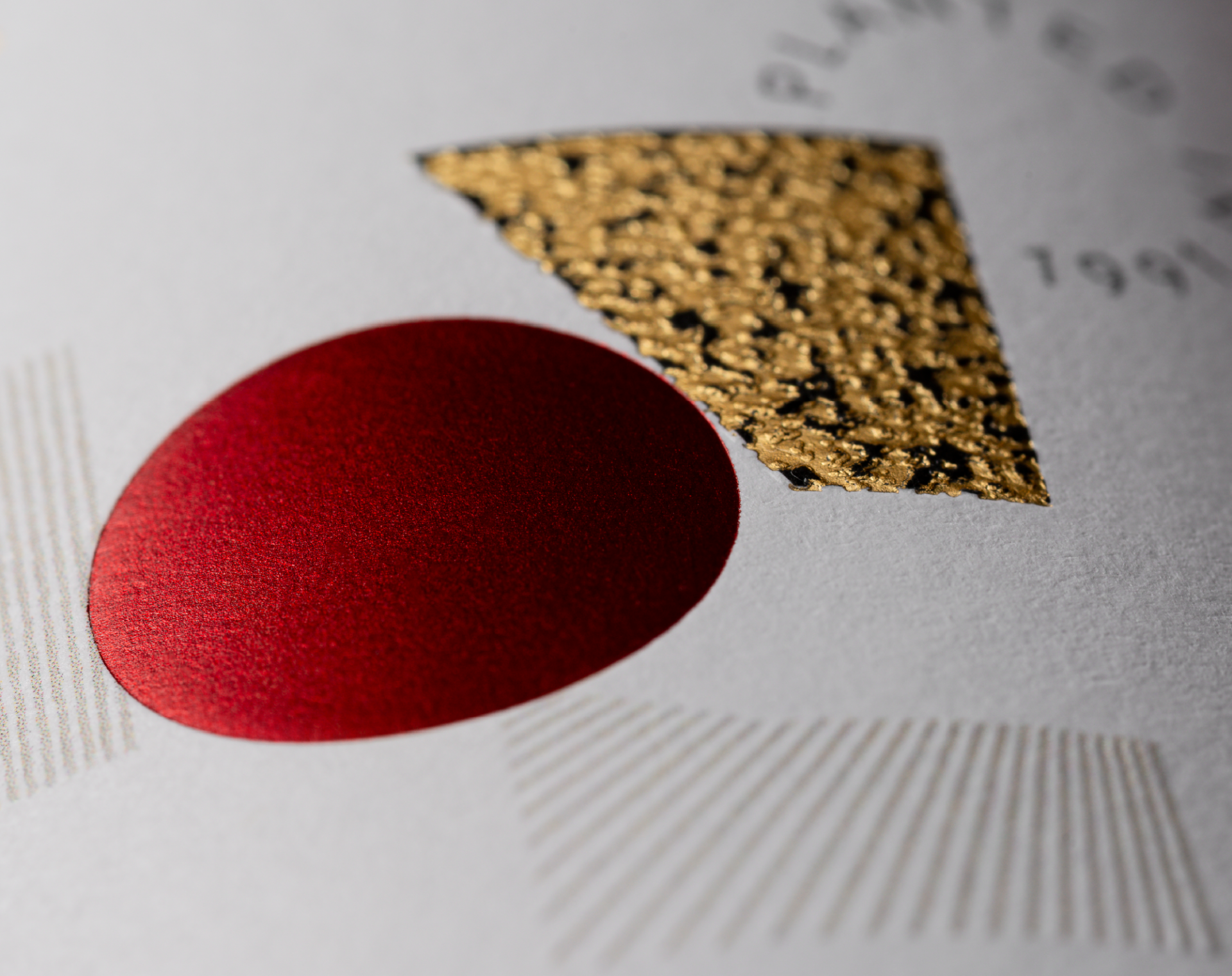 Detailed close up showing the red foil dot and vineyard embellishment from the Shiraz label.