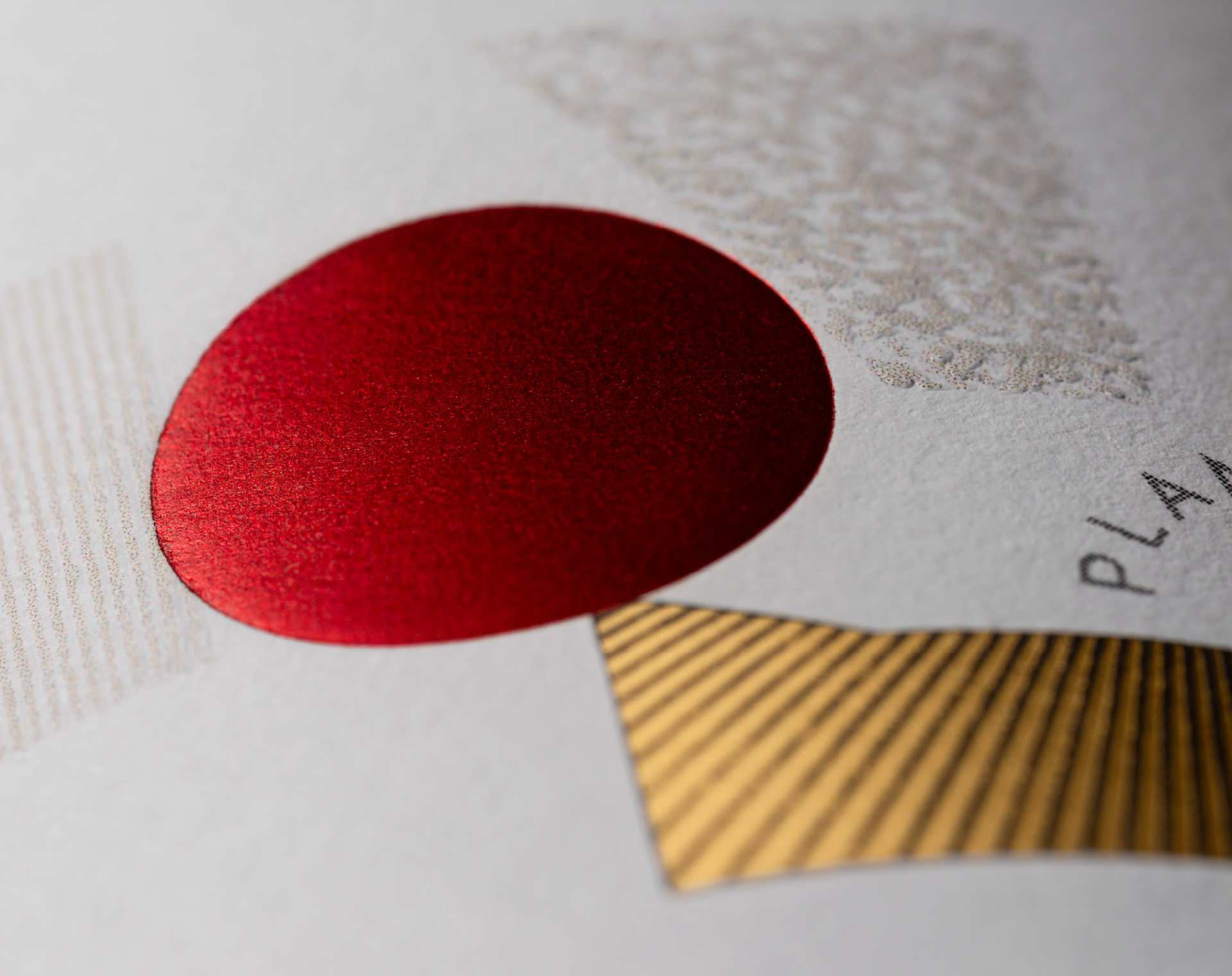 Detailed close up showing the red foil dot and vineyard embellishment from the Cabernet label.