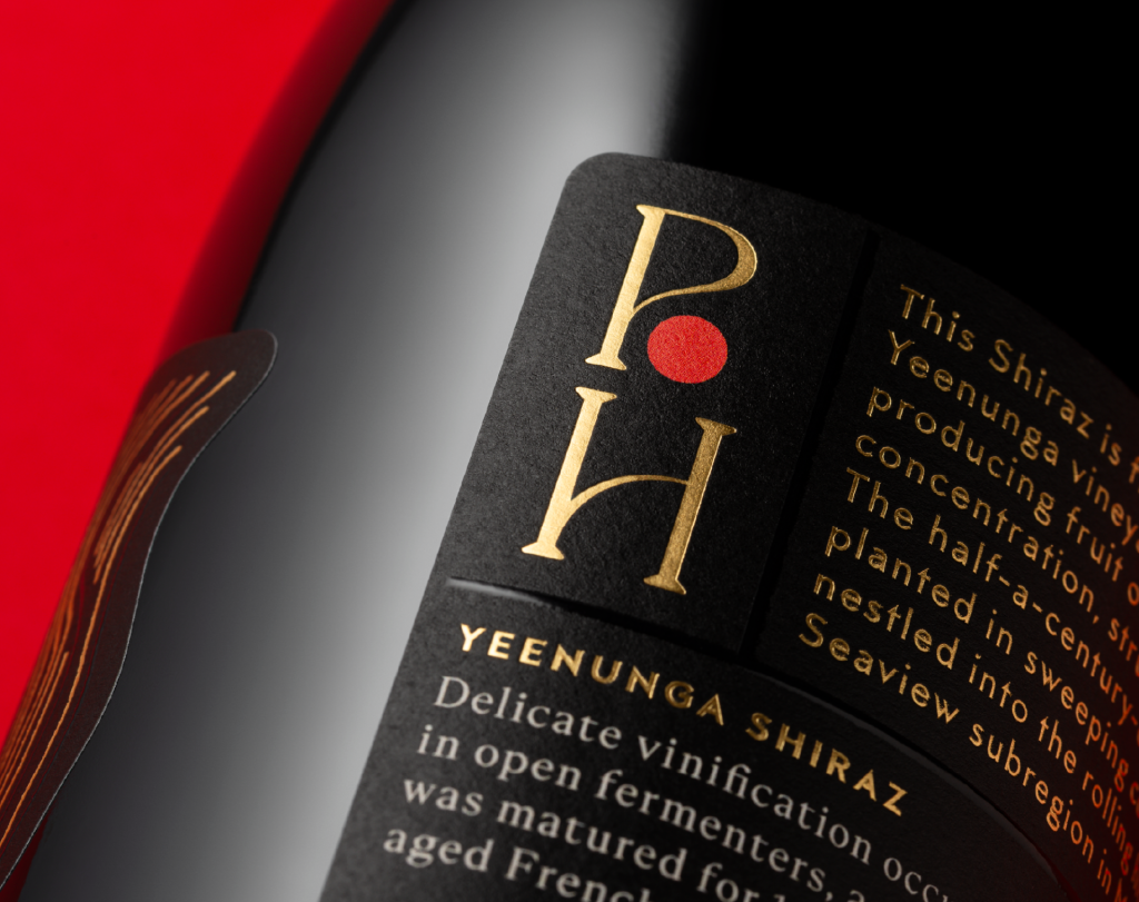 Close up of the Yeenunga Shiraz packaging design showing a portion of the back label with gold foil.