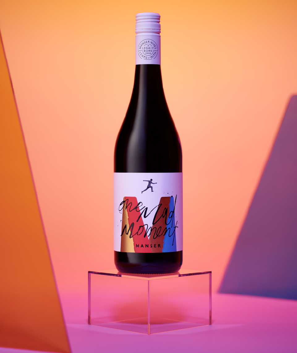 Manser Wines One Mad Moment wine label with expressive handwritten typography and large foil detailing.